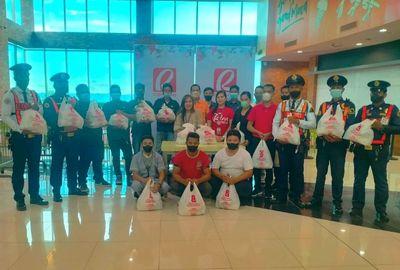 RLove imparts relief packs to employees and communities affected by Typhoon Paeng in Antique